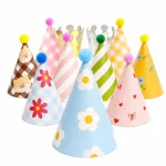 Olen 11-pack kids party hats: 9 patterned paper cone hats with pom poms and 2 metallic crowns